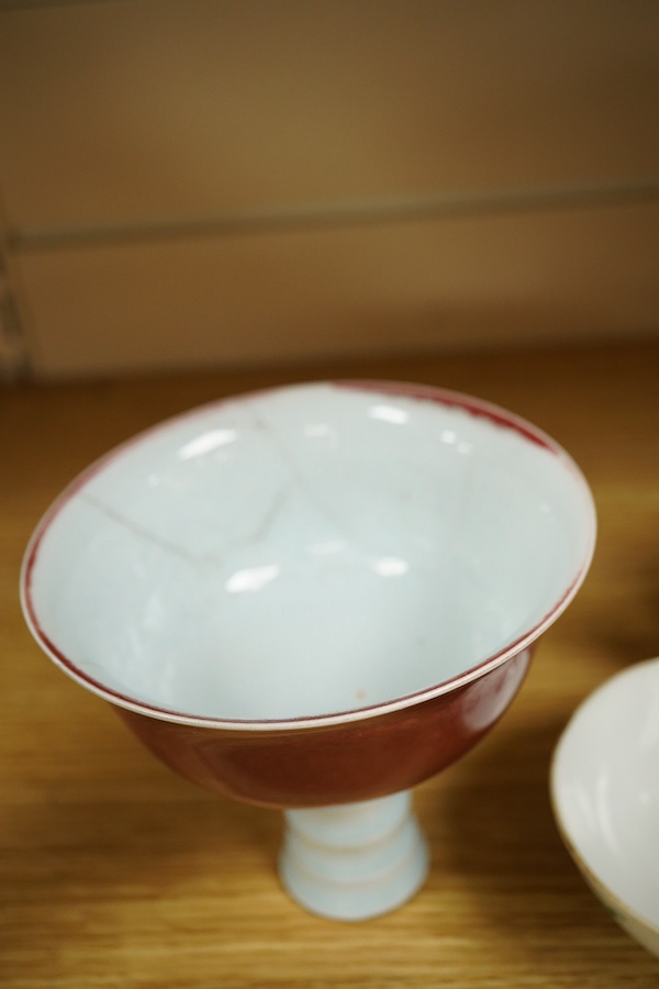 An early 20th century Chinese famille rose teapot, later famille rose teabowl, sang de boeuf stem bowl and two others, tallest 11cm. Condition - varies